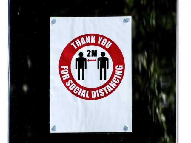 Photo of social distancing sign