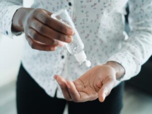 Photo of woman using handgel