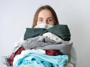 Photo of woman holding laundry