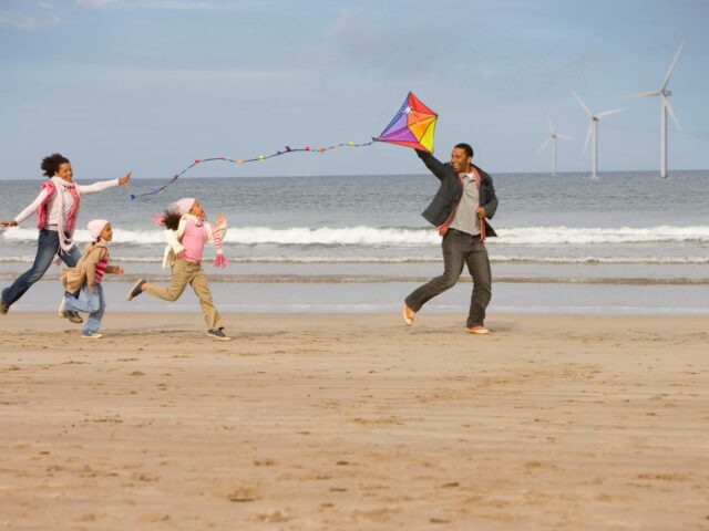 Photo of family on the beach
