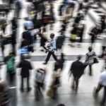 a crowded station concourse suggesting diversity of population