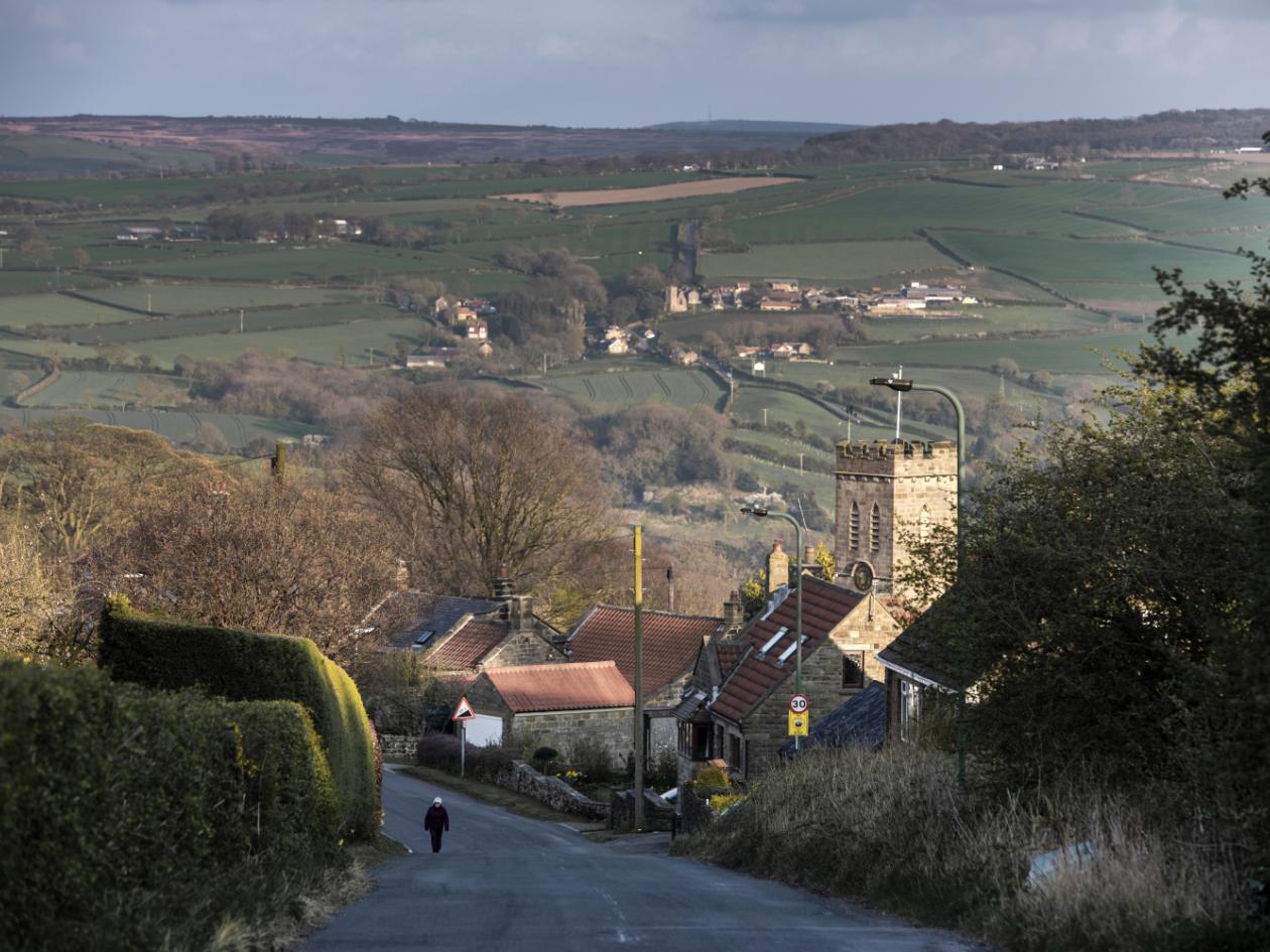 a church and village on an English country road