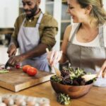 couple preparing a salad