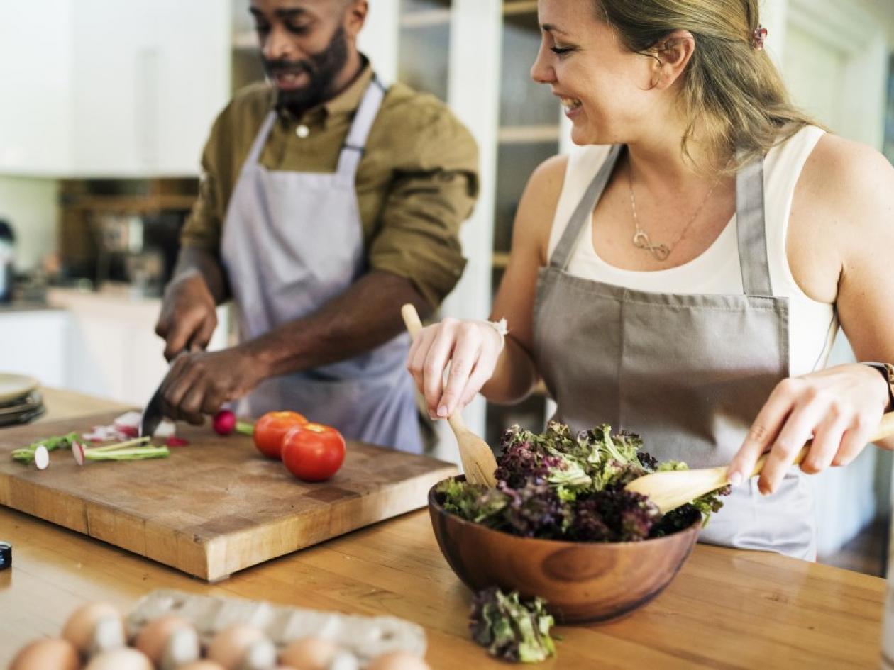 couple preparing a salad