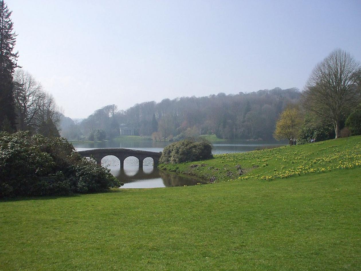 Stourhead - the garden of a National Trust property showing a lawn and a lake