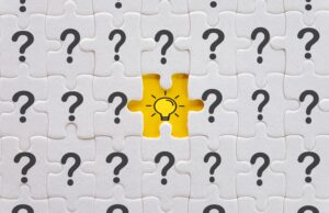 Phot of question marks and a light bulb