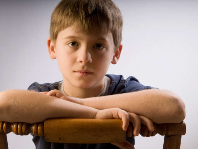 Photo of child on chair