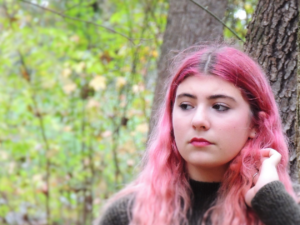 Photo of teenage girl with pink hair