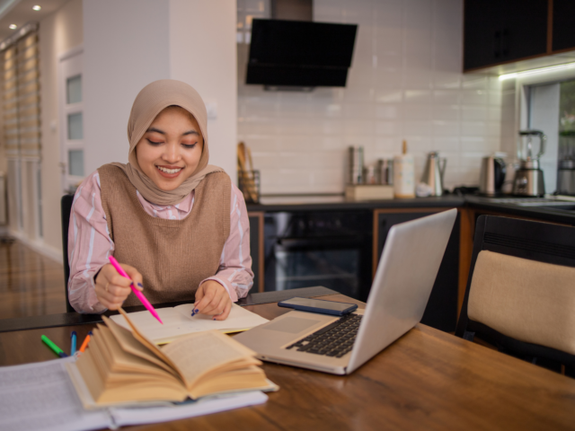 Woman working online at home