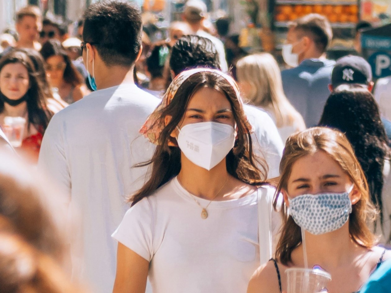 People wearing masks in the street during the pandemic