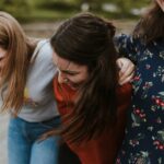 A group of teenage friends, laughing